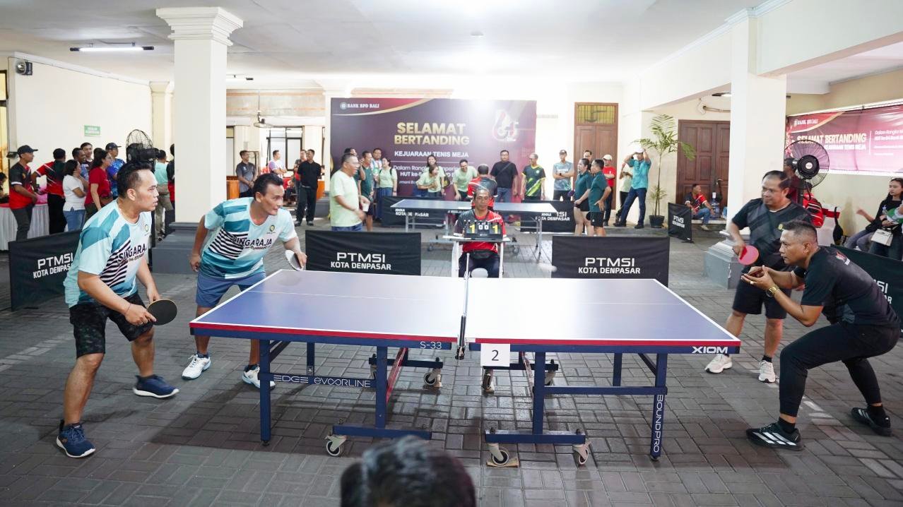 Dirut Bank BPD Bali Nyoman Sudharma perkuat harmoni dan stabilitas internal lewat turnamen tenis meja HUT ke-64 dalam laporan MD Suteja